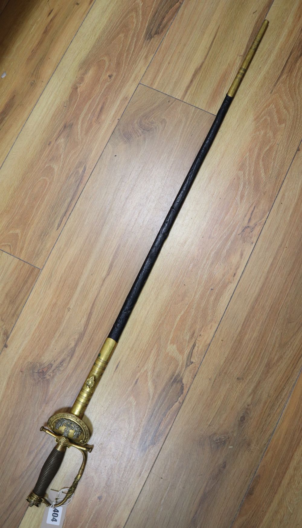 A Naval officers dress sword, length 84cm